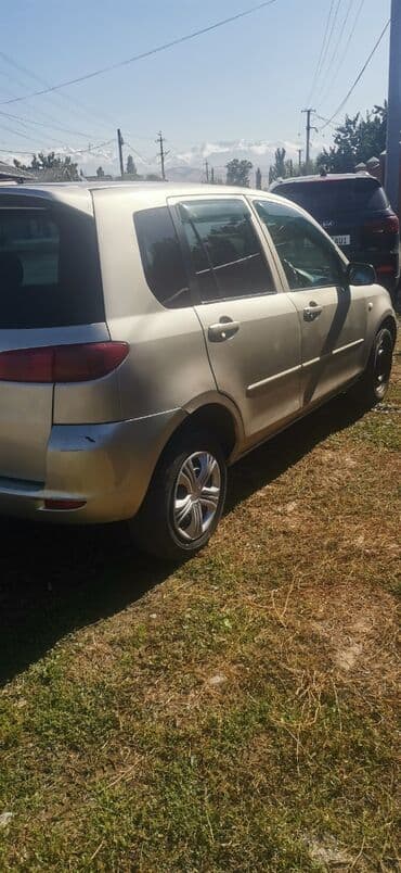 дом на кол: Mazda Demio: 2003 г., 1.3 л, Автомат, Бензин, Хэтчбэк — 3