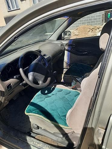 lada 2105: Daewoo Leganza: 1997 г., Седан — 3