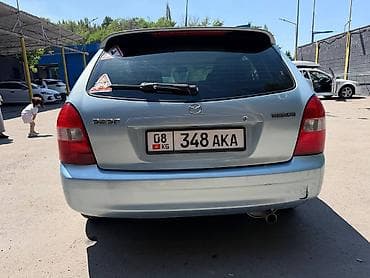 ford focus 2002: Mazda 323: 2001 г., 1.6 л, Автомат, Бензин, Хэтчбэк — 4