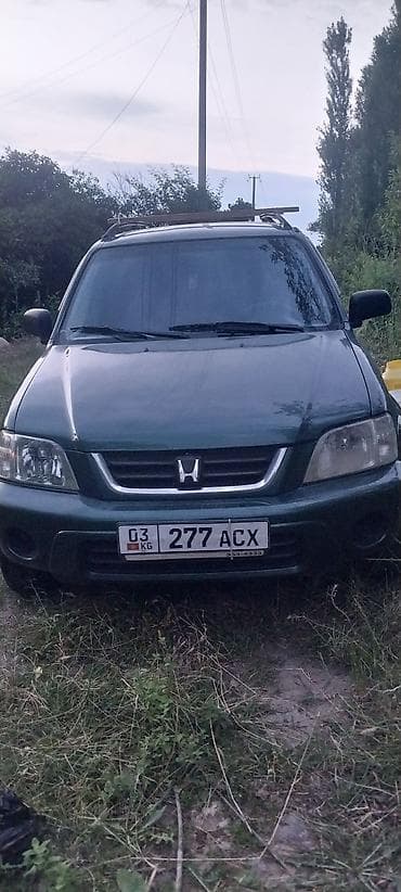 срв 4 поколения: Honda CR‑V I (рестайлинг), зелёный внедорожник/кроссовер. Кузов и — 2