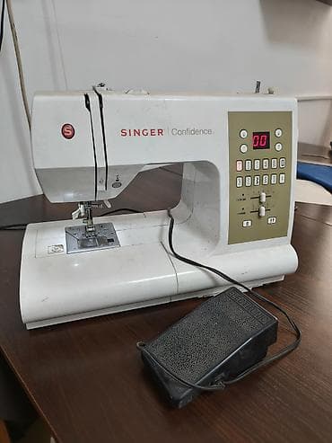 Продаю компьютеризированную бытовую швейную машинку Singer Confidense — 1