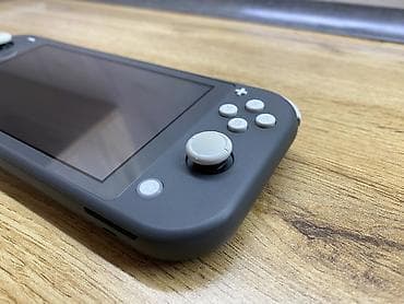 Портативные консоли: Продаю Nintendo Switch Lite чипованая Карта памяти 256gb Состояние — 6