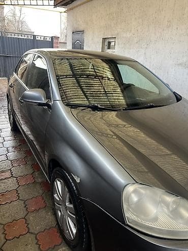 Транспорт: Volkswagen Jetta: 2010 г., 1.4 л, Автомат, Бензин, Седан — 4