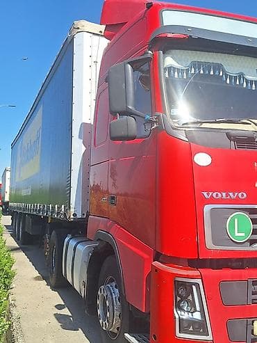 volvo 2014: Тягач, Volvo, Тентованный — 3