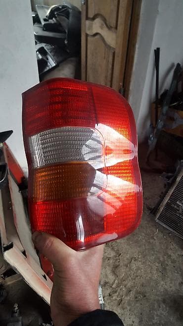 opel: Opel Combo задний плафон передние фары рулевая рейка — 1