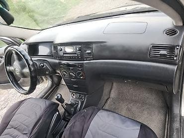 салон машины: Toyota Corolla: 2005 г., 1.6 л, Механика, Бензин, Седан — 3