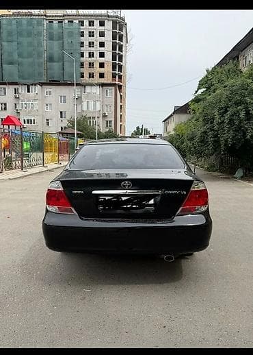 салон машины: Toyota Camry: 2004 г., 0.3 л, Автомат, Бензин, Седан — 5