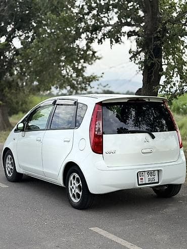 водиной туман: Mitsubishi Colt: 2004 г., 1.3 л, Вариатор, Бензин, Хэтчбэк — 6