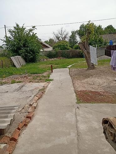 Үйлөр: Продаётся сквозной участок с домом 6,96 соток, напротив парка — 9