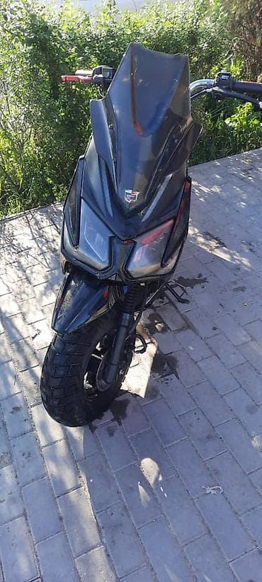 kia ev9: Скутер 50–125 см³, спортивный дизайн, черный цвет.срочно Особенности — 1