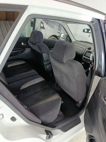 глушитель гольф 2 1.8 бензин: Mazda Familia: 2001 г., 2 л, Автомат, Бензиновая, Универсал — 8