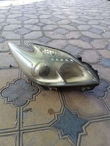 бегущий поворотник: Передняя левая фара Toyota — 6