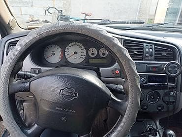 210 сиденья: Nissan Primera: 2000 г., 2 л, Ручные, Бензин, Универсал — 1