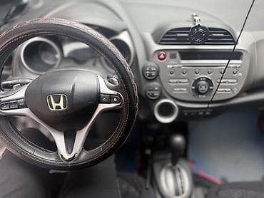 golf v: Honda Jazz: 2009 г., 1.3 л, Автомат, Бензин, Хэтчбэк — 7