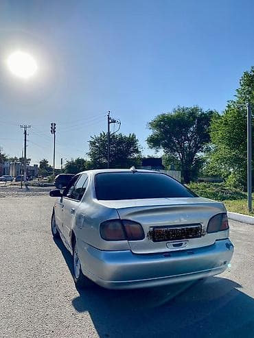 күзгү: Nissan Primera: 2001 г., Седан — 4