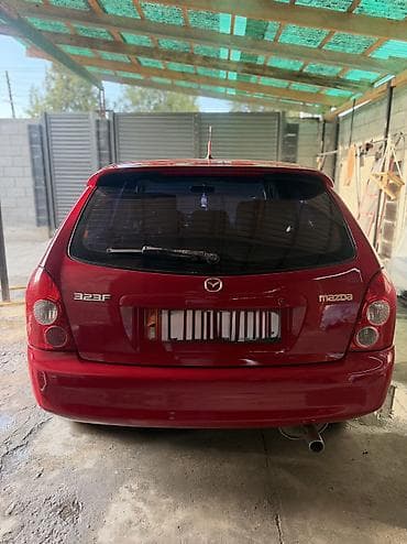 rx 7: Mazda 323: 2002 г., 1.6 л, Механика, Бензин, Хэтчбэк — 4