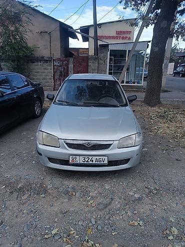Mazda 323: 1999 г., 1.6 л, Автомат, Бензин, Хэтчбэк — 1