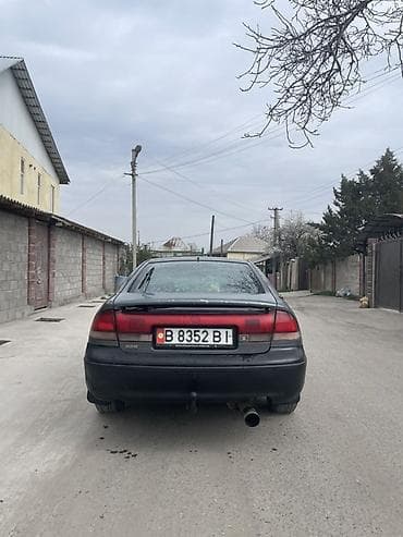 вампер 124: Mazda 626: 1995 г., 2 л, Ручные, Бензин, Седан — 2
