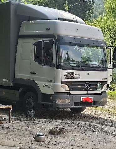 b class: Талас Бишкек Грузоперевозки до 12 тонн. есть боковая и верхняя — 1