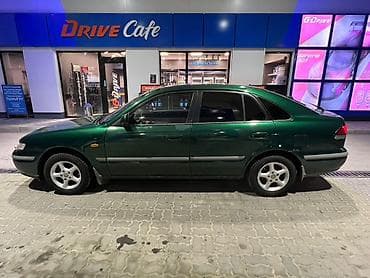 34 bwm: Mazda 626: 1998 г., 1.8 л, Механика, Бензин, Седан — 4