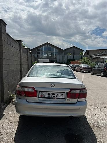 чехлы на морнинг: Mazda Capella: 2001 г., 2 л, Механика, Бензин, Седан — 5