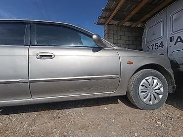 apollo solo: Kia Spectra: 2002 г., 1.6 л, Ручные, Бензин, Седан — 4
