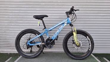 купить велосипед с большими шинами: Горный велосипед с рамой синего цвета и желтыми элементами на передней — 1