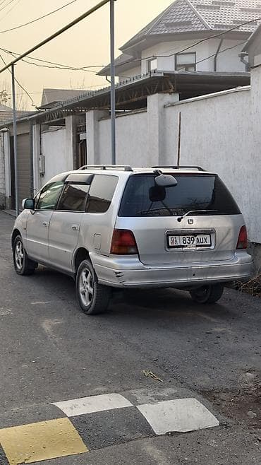 авто одиссей: Honda Odyssey: 1996 г., 2.2 л, Автомат, Бензин, Минивэн — 6