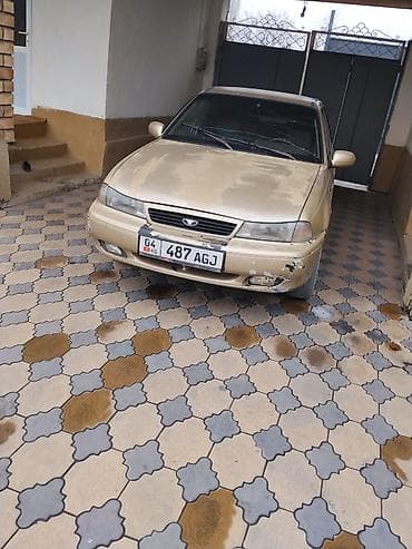 Унаа: Daewoo Nexia: 1997 г., 1.5 л, Кол менен иштөөчү, Бензин, Седан — 3