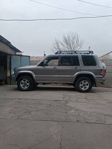 купить зимние шины на 14 бу: Isuzu Trooper: 2001 г., 3.5 л, Механика, Газ, Внедорожник — 2