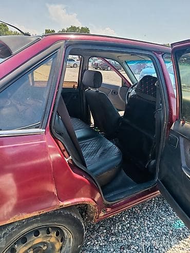 левый: Daewoo Nexia: 2011 г., 1.5 л, Механика, Бензин, Седан — 2