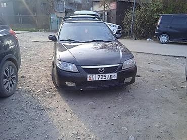 Mazda 323: 2003 г., Универсал