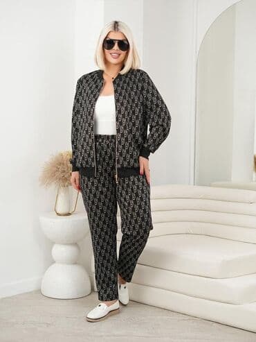 спортивные пуховики: Женский спортивный костюм, состоящий из куртки-бомбера на молнии и — 11