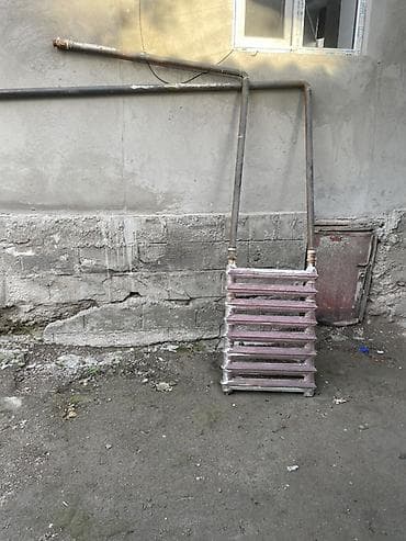 газовые котлы настенные: Секционный чугунный радиатор отопления с подводкой. - Материал: чугун — 2