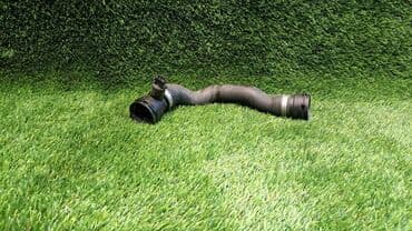 блок предохранителей: Патрубок BMW 2009 г., Б/у, Оригинал, Германия — 1