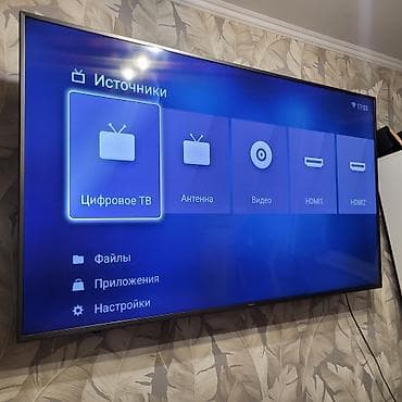 tab a: Телевизор YASIN, диагональ около 55–65" (тонкие рамки, настенное — 3