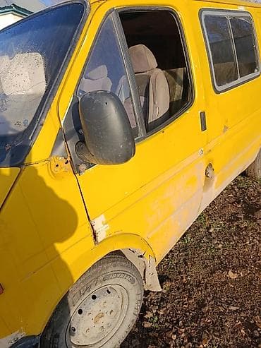 Желтый грузопассажирский фургон Ford Transit (поколение 1990‑е) at lalafo.kg Желтый грузопассажирский фургон Ford Transit (поколение 1990‑е)