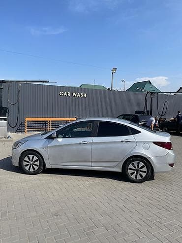 выхлопы машин: Hyundai Solaris: 2015 г., 1.6 л, Автомат, Бензин, Седан — 2