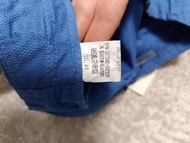 Носки и белье: Женские брюки-чиносы синего цвета. Характеристики: - Фасон: прямые — 2