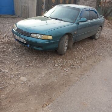 neta авто: Mazda 626: 1994 г., 2 л, Механика, Бензиновая, Седан — 1