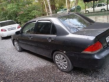 нокен: Mitsubishi Lancer: 2003 г., 1.8 л, Автомат, Бензин, Седан — 5