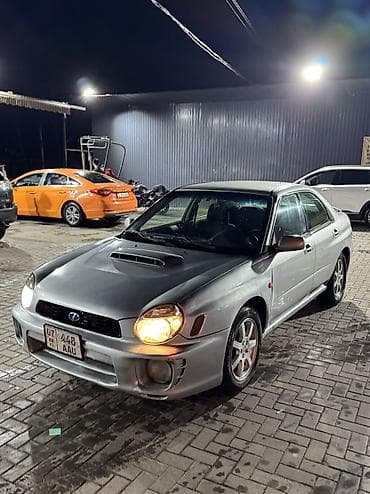 простой: Subaru Impreza: 2001 г., 2 л, Автомат, Газ, Седан — 7