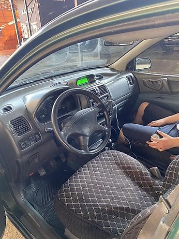 митсубиши спес стар: Mitsubishi Space Star: 2000 г., 1.3 л, Механика, Бензин, Хэтчбэк — 5