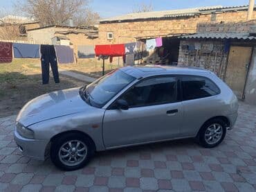 мото формы: Mitsubishi Colt: 1996 г., 1.6 л, Механика, Бензиновая, Купе — 3