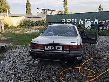 бюджетные авто: Mazda 626: 1991 г., 2 л, Механика, Седан — 5