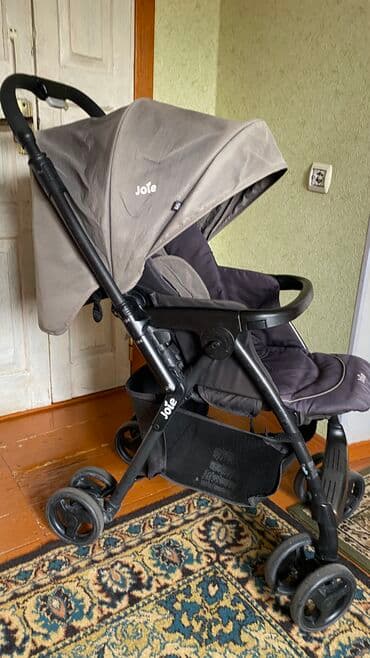 продаю коляску трость: Коляска, цвет - Черный, Б/у — 1