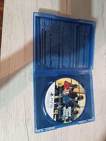 Видеоигры: Диски для PlayStation: 1) Grand Theft Auto V — версия для PS5 (диск в — 2