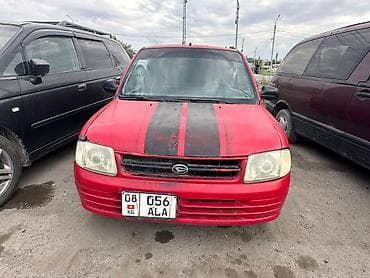 Daihatsu Cuore: 2001 г., 1 л, Механика, Бензин, Хэтчбэк — 2