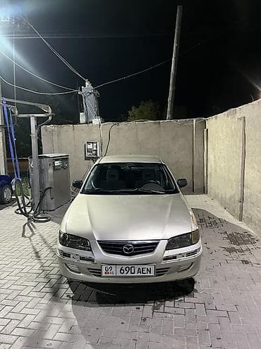 Mazda 626: 2001 г., Механика, Седан — 1