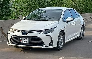 corolla: Toyota Corolla: 2019 г., 1.8 л, Автомат, Гибрид, Седан — 2